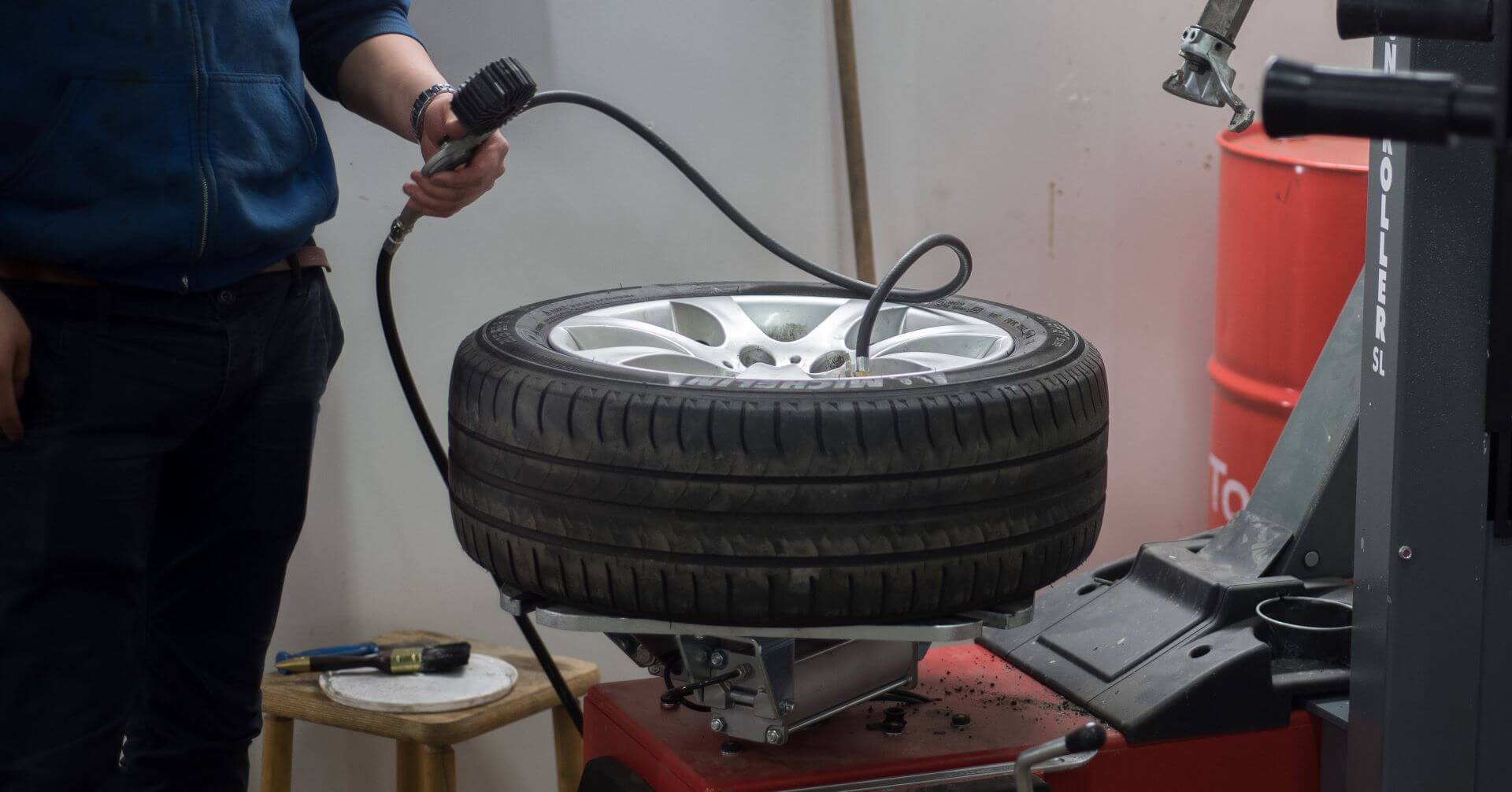 Summit Trucks service technician checking optimal pressure for tires