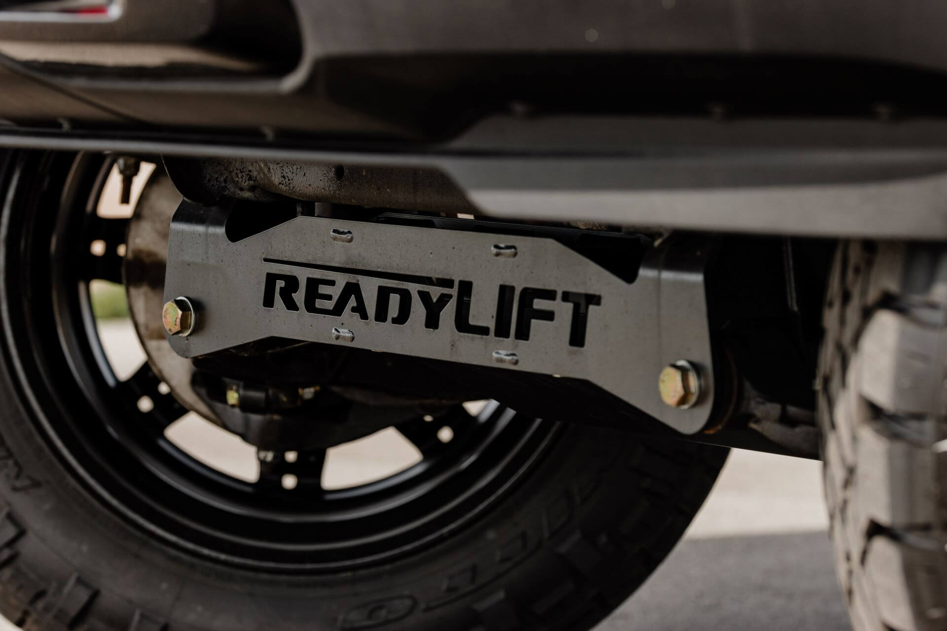 a ReadyLIFT package viewable from under the chassis of a custom truck