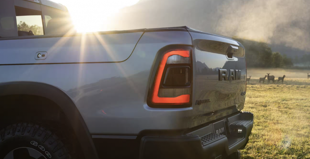 Rear view of a grey Ram 1500 in a field