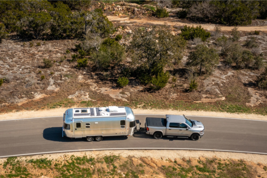 2025 Ram 1500 Towing Capability - Showcasing the truck hauling a heavy trailer