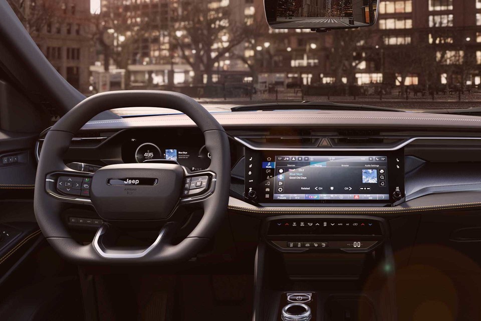 2026 Jeep Cherokee Overland interior — panoramic sunroof, 12.3-inch Uconnect 5, and premium leatherette cabin