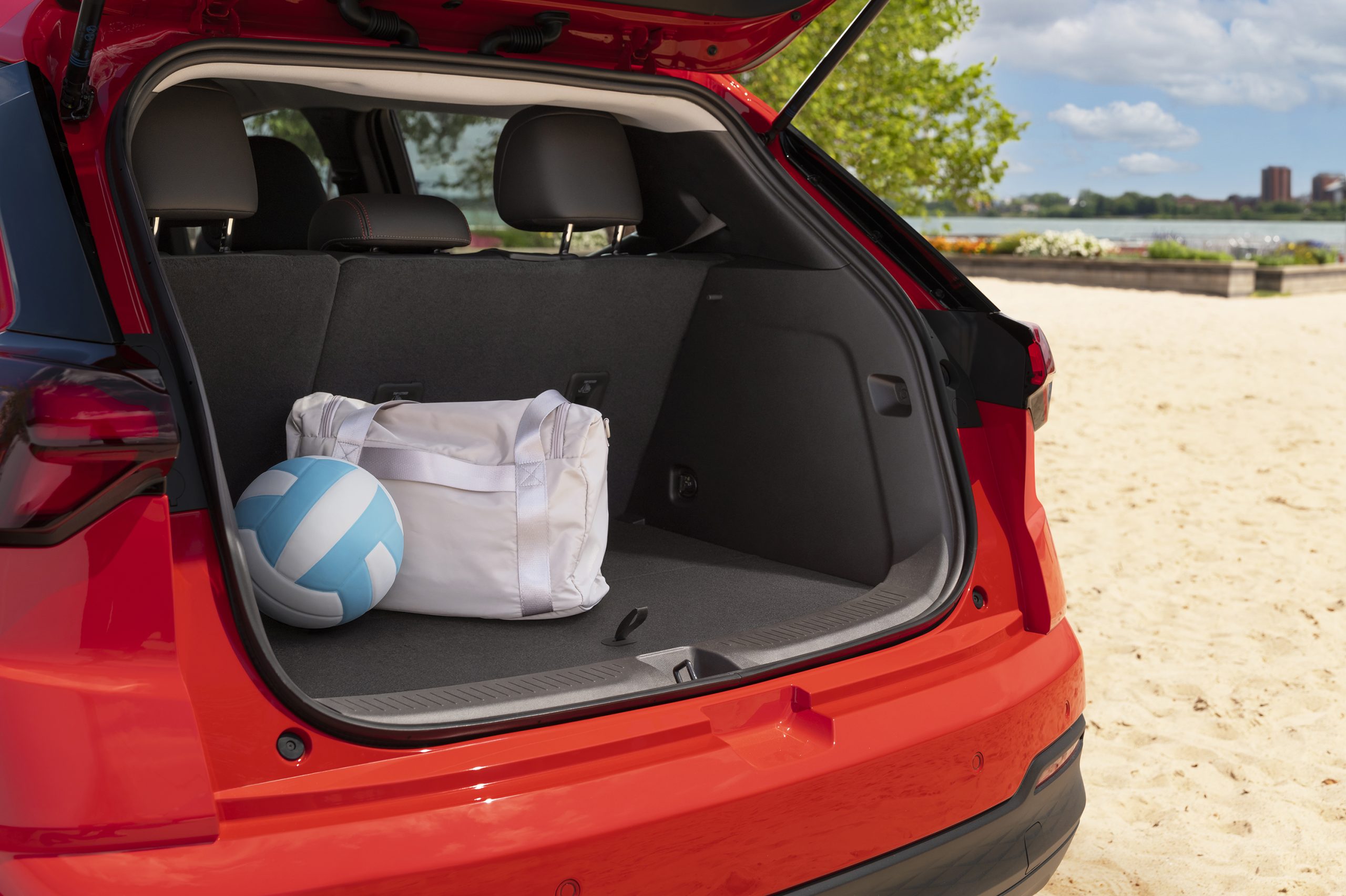 2027 Chevrolet Bolt open hatchback showing cargo space and interior access