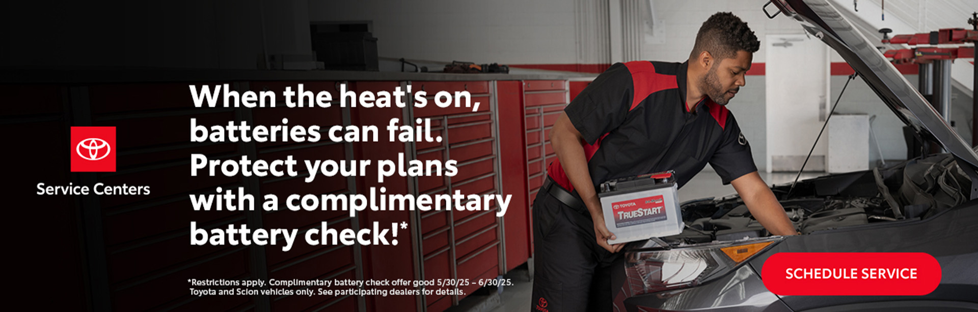 June Toyota Battery Health Check, Mechanic replacing battery