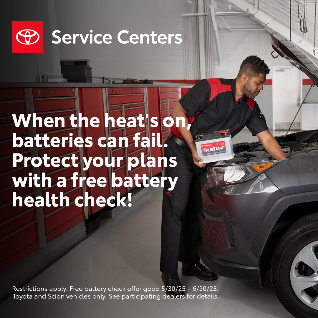 June Toyota Battery Health Check, Mechanic replacing battery