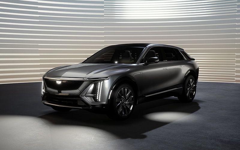 Grey Cadillac SUV displayed in a showroom