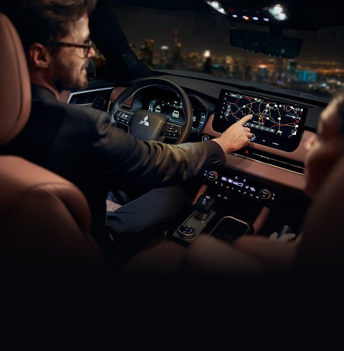 Mitsubishi Outlander driving in low‑grip conditions illustrating S‑AWC