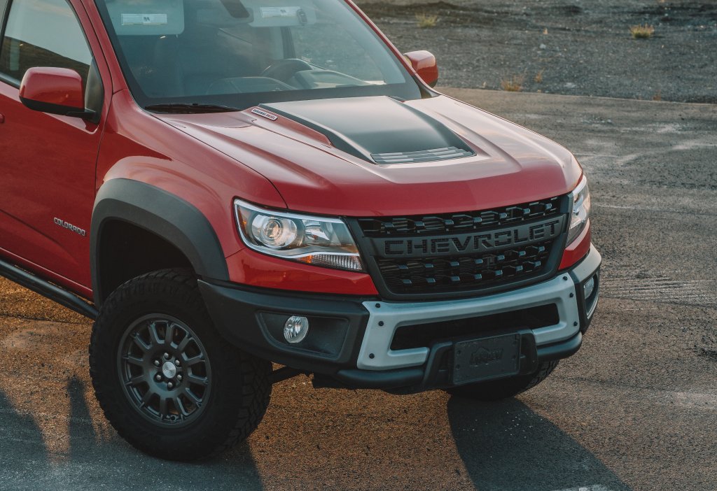 red Chevrolet Colorado pickup truck