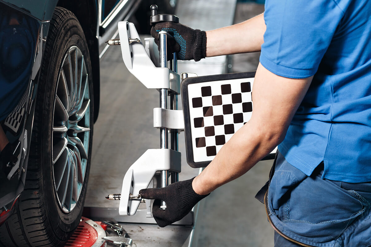 FOUR WHEEL ALIGNMENT AND BRAKE INSPECTION
