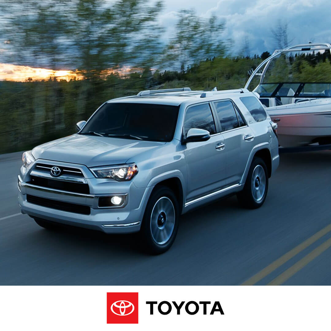 2024 Toyota 4Runner driving on road, showcasing towing strength