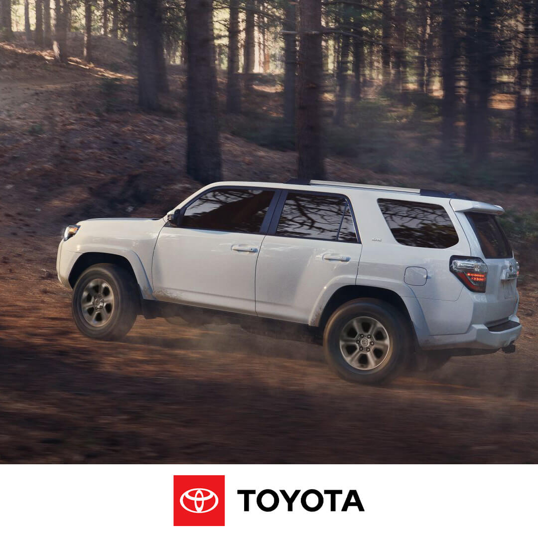 2024 Toyota 4Runner - side view ower climbing through the woods