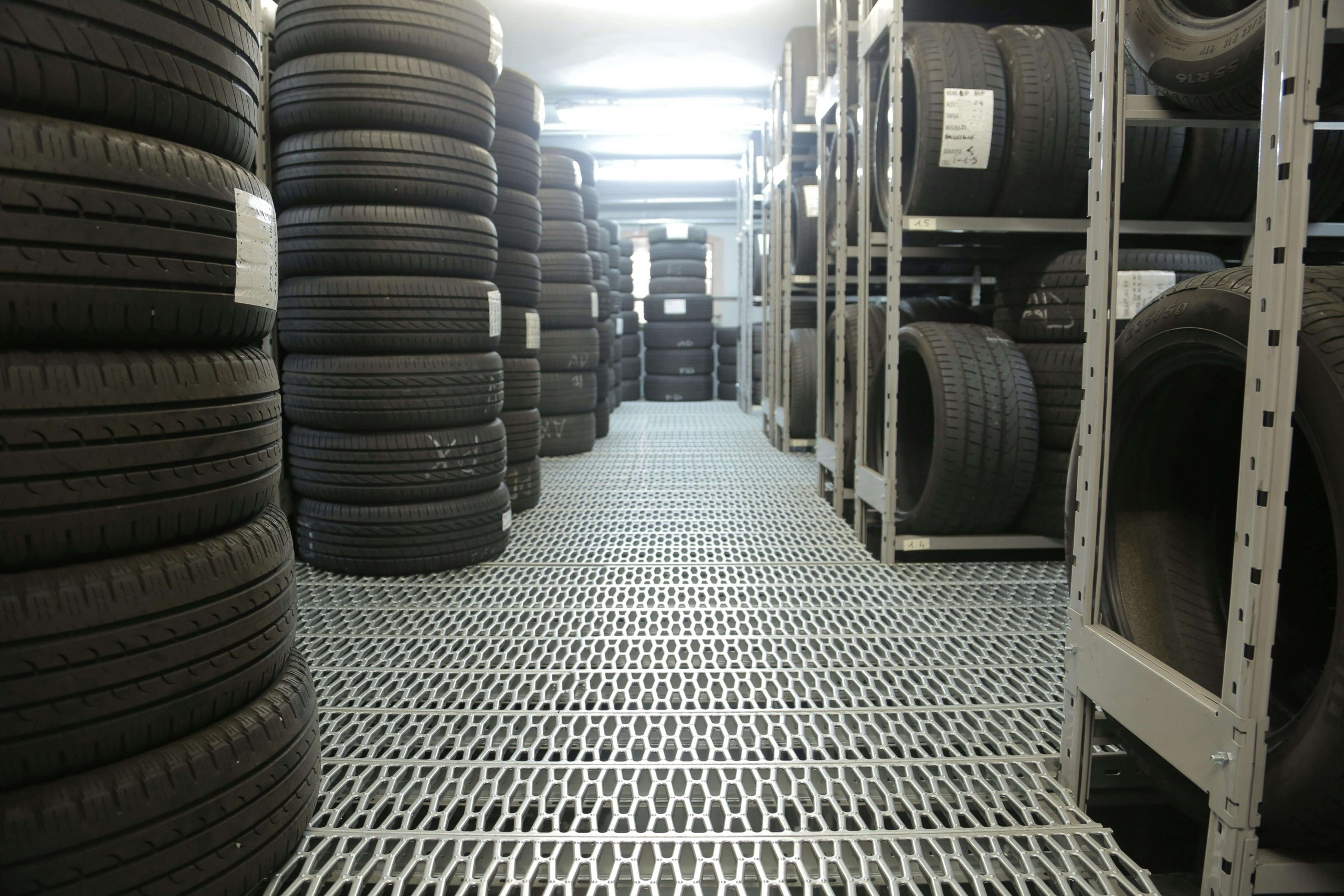 A tire storage room, showing a wide range of different tire types.