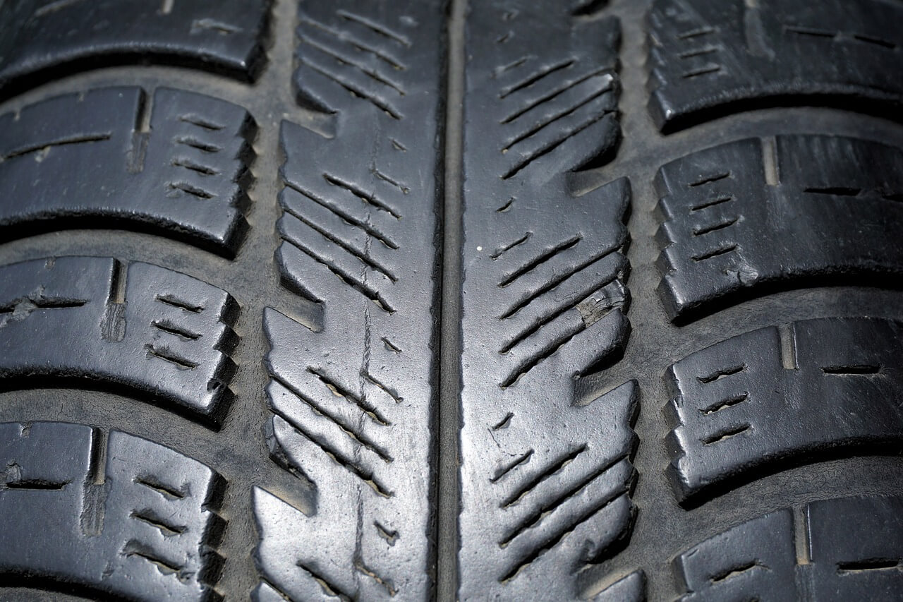 A closeup of the treads on a tire.