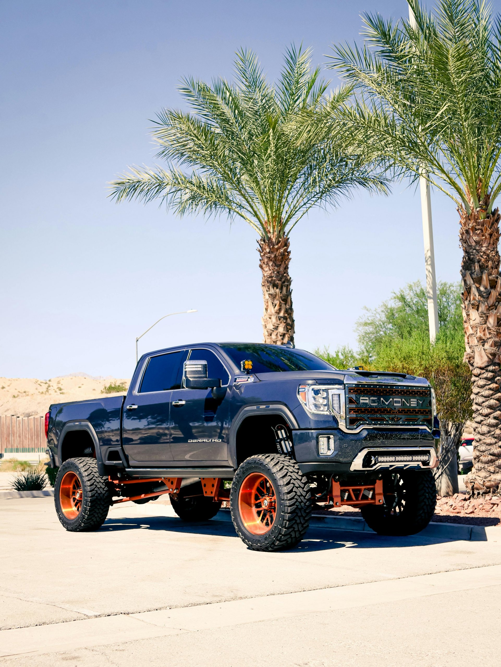 A GMC Sierra Denali trim parked in a scenic locale