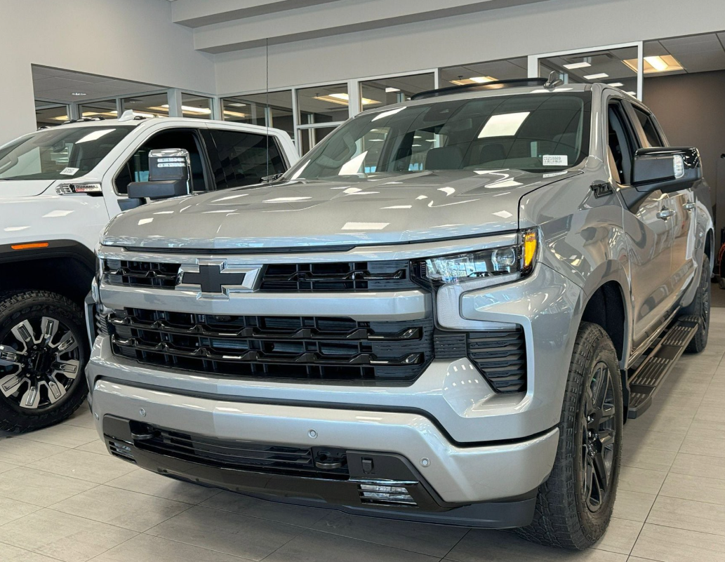 A new 2025 Chevrolet Silverado 1500 4WD in front 7/8 profile for sale sitting in Shaw GMC's showroom