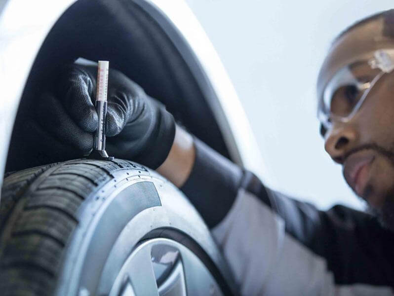 checking tire tread depth