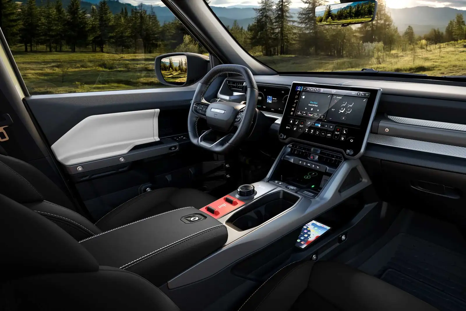 Jeep Recon cockpit with 14.5 inch touchscreen and red console switch bank