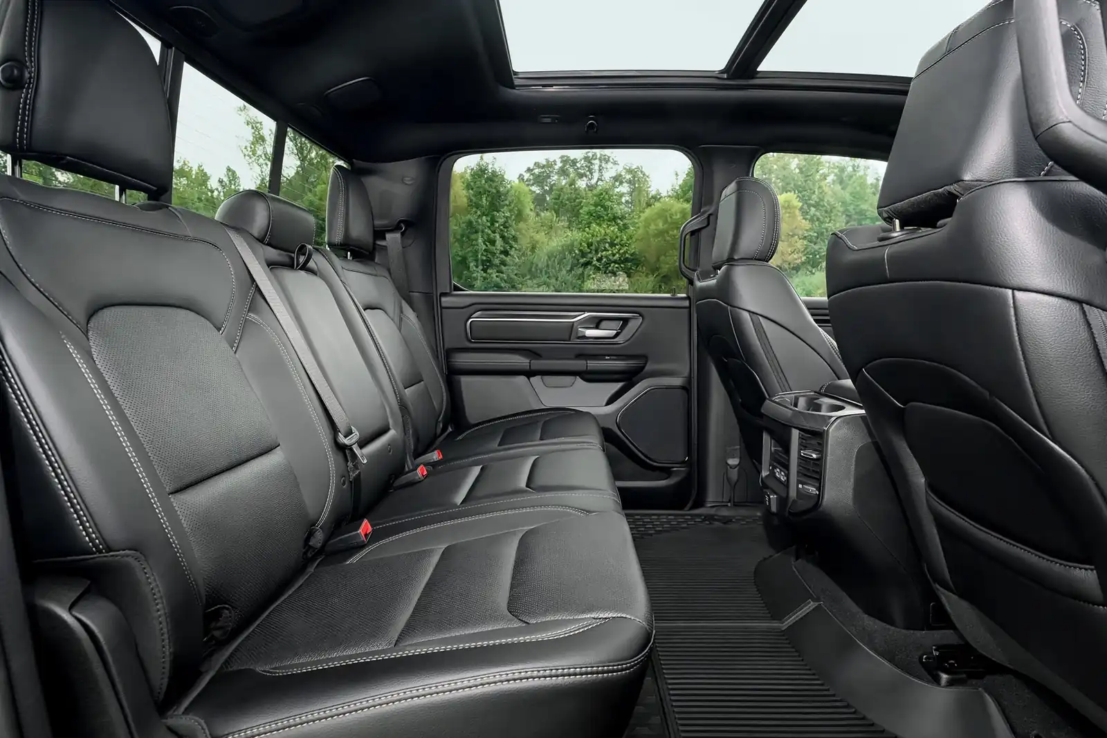 2026 Ram 1500 front cabin with bench seating and the Uconnect touchscreen in the dash