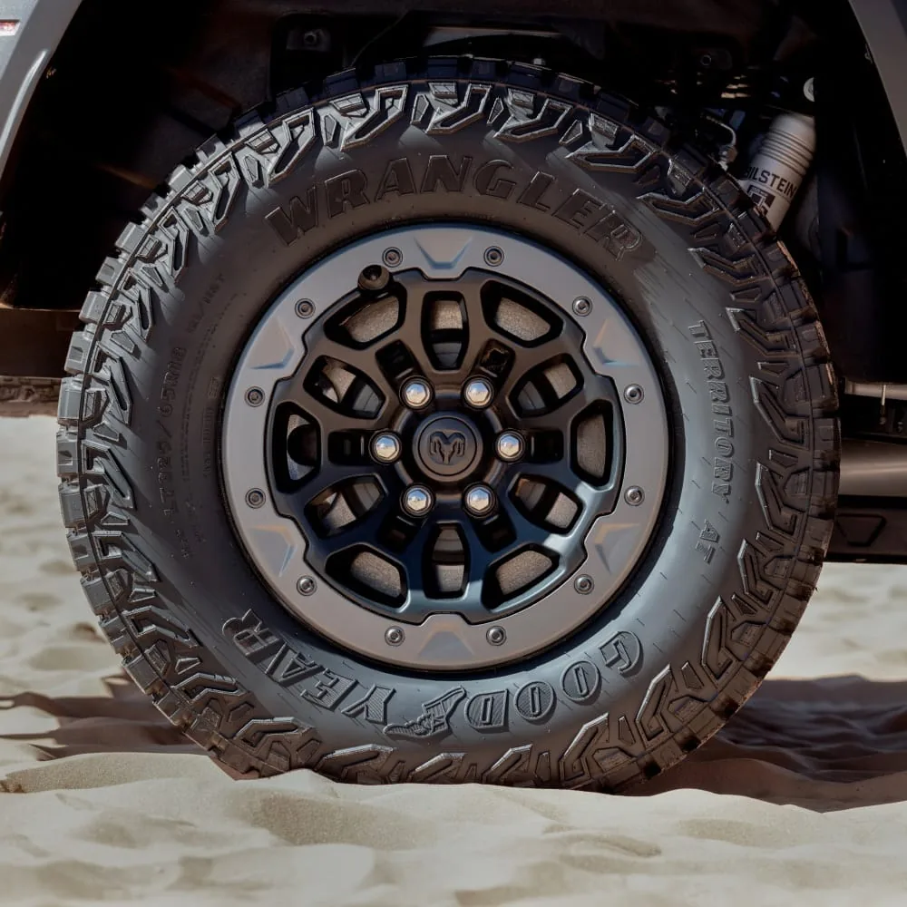 2027 Ram 1500 TRX close up of the 35 inch tire, beadlock style wheel and Bilstein performance shock