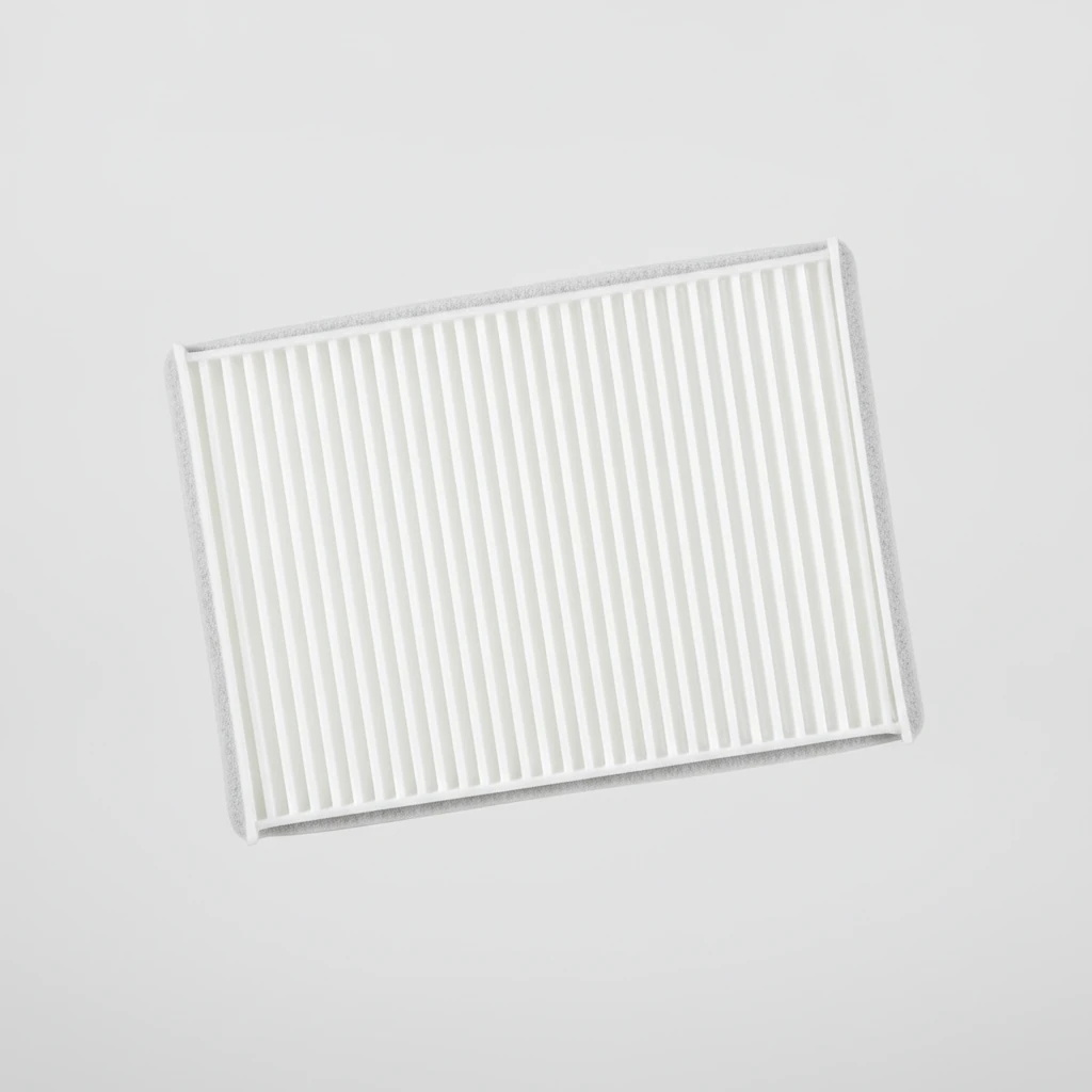 fresh pleated cabin air filter showing clean white pleats