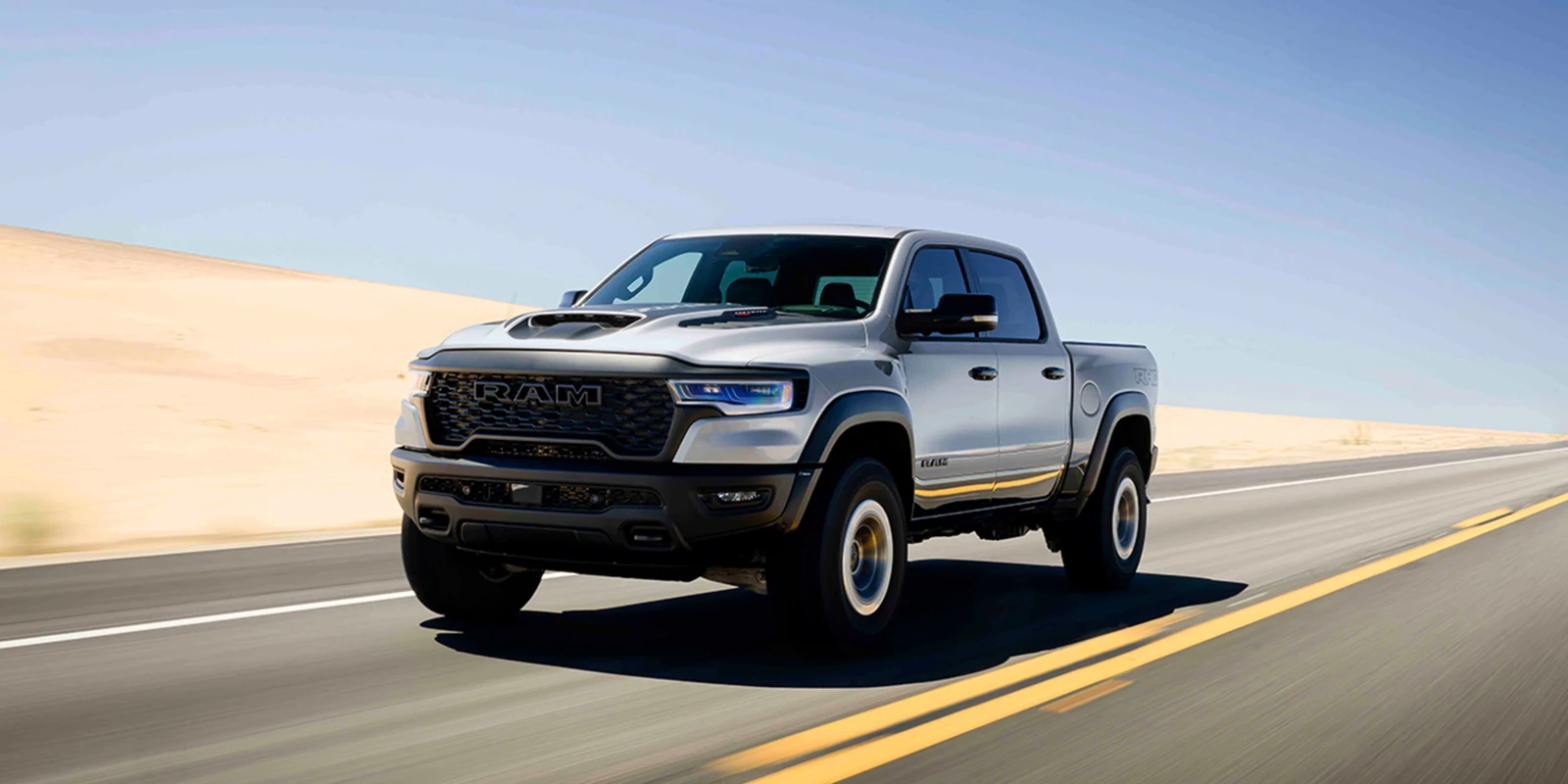 Ram 1500 running at speed on an open prairie highway