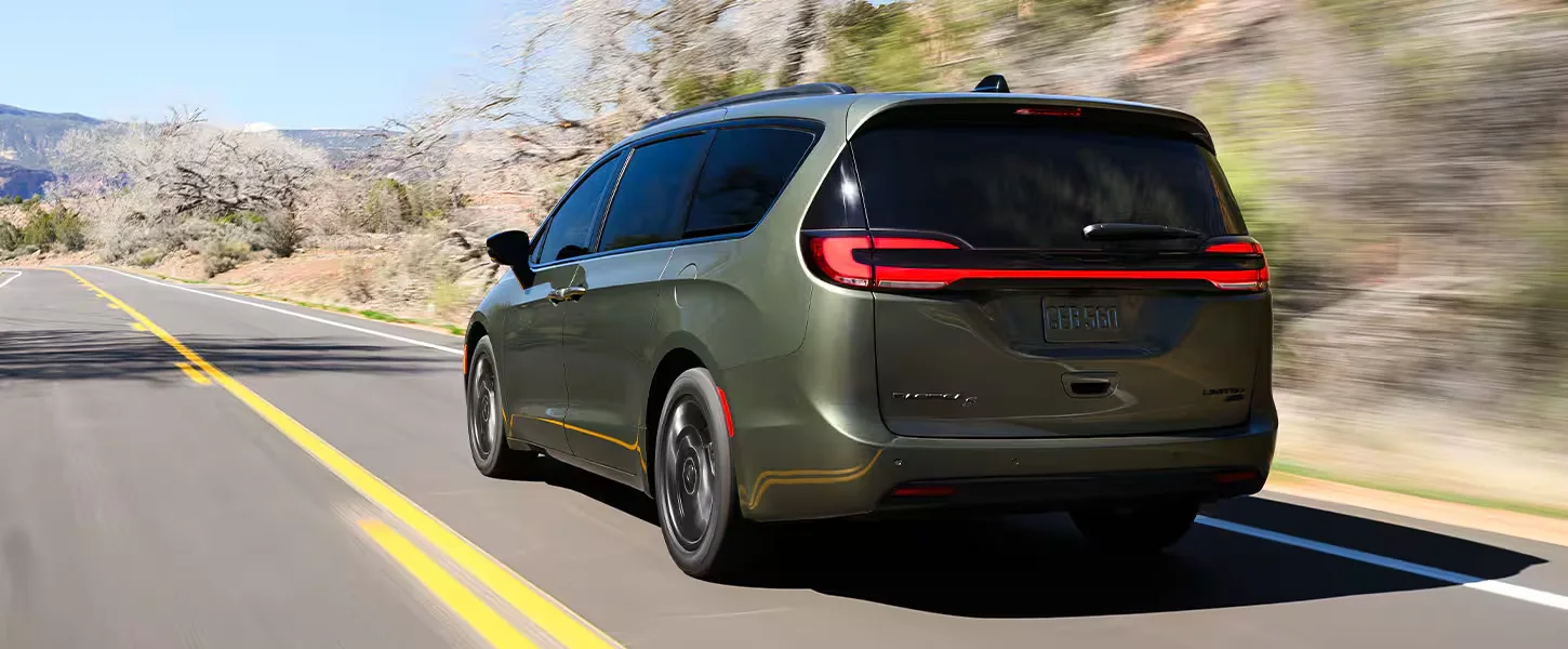 2027 Chrysler Pacifica in Olive Green rear three quarter showing the full width tail lightbar