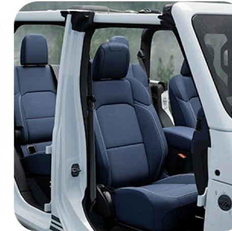 Jeep Gladiator Rubicon blue leather front and rear seats seen through the open door