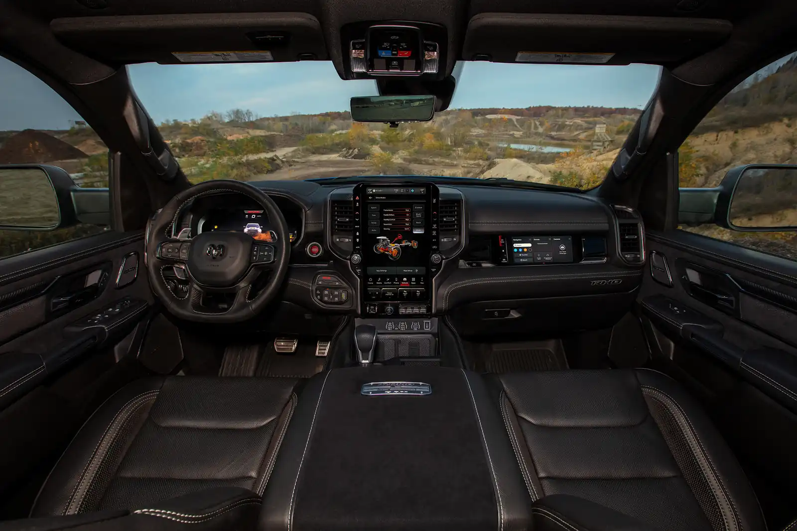 2026 Ram 1500 interior cockpit with steering wheel and centre touchscreen