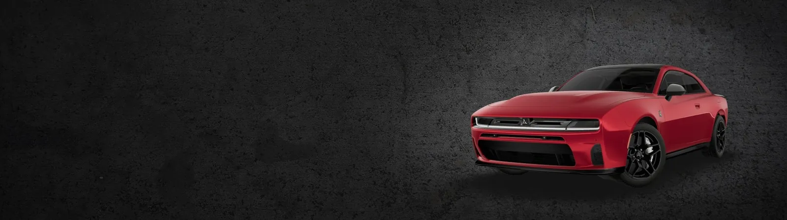 red Dodge Charger two door front three quarter on a dark studio background