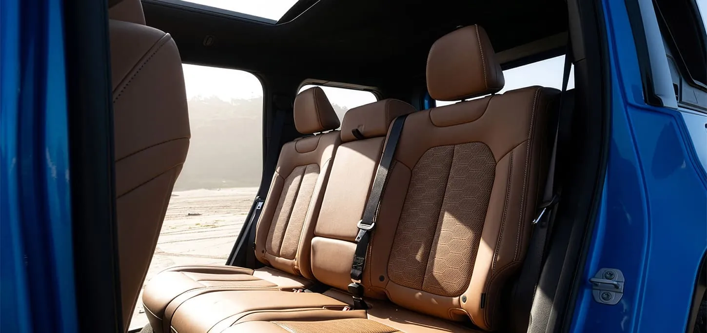 Jeep Recon rear seats in brown leather with doors removed