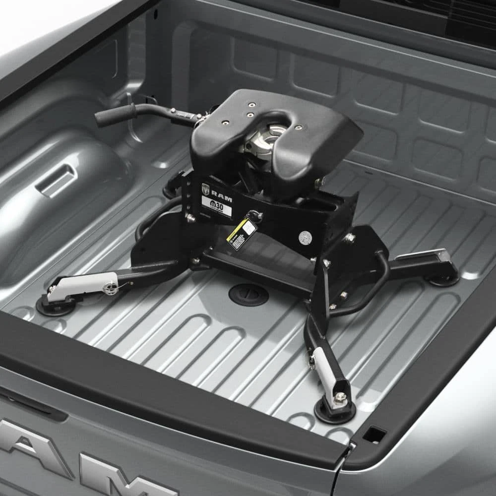 factory fifth wheel hitch mounted in the bed of a Ram 2500 Heavy Duty