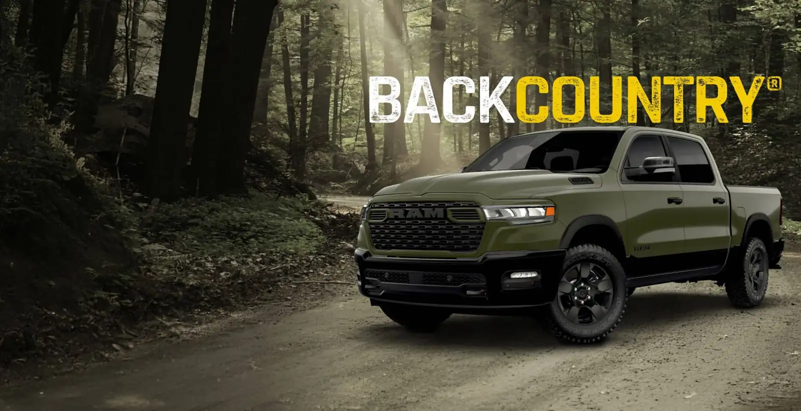 2026 Ram 1500 BackCountry rear three quarter showing black flares and off road tires