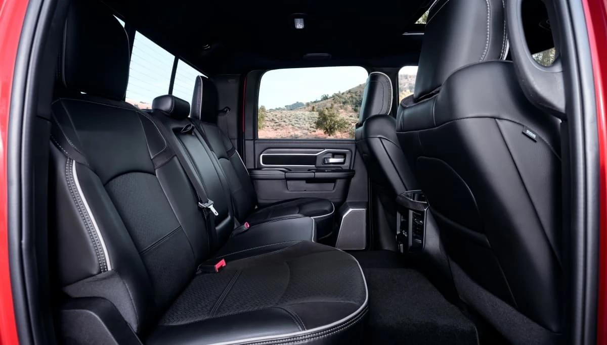 Ram 2500 crew cab rear seat cabin with black leather back seats