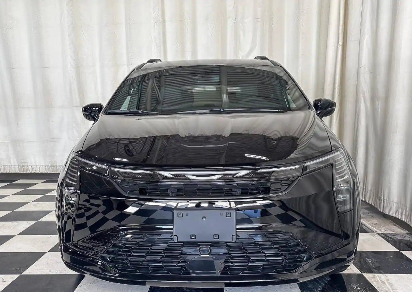 Diamond Black Crystal Pearl Chrysler Pacifica Select photographed on the dealership lot