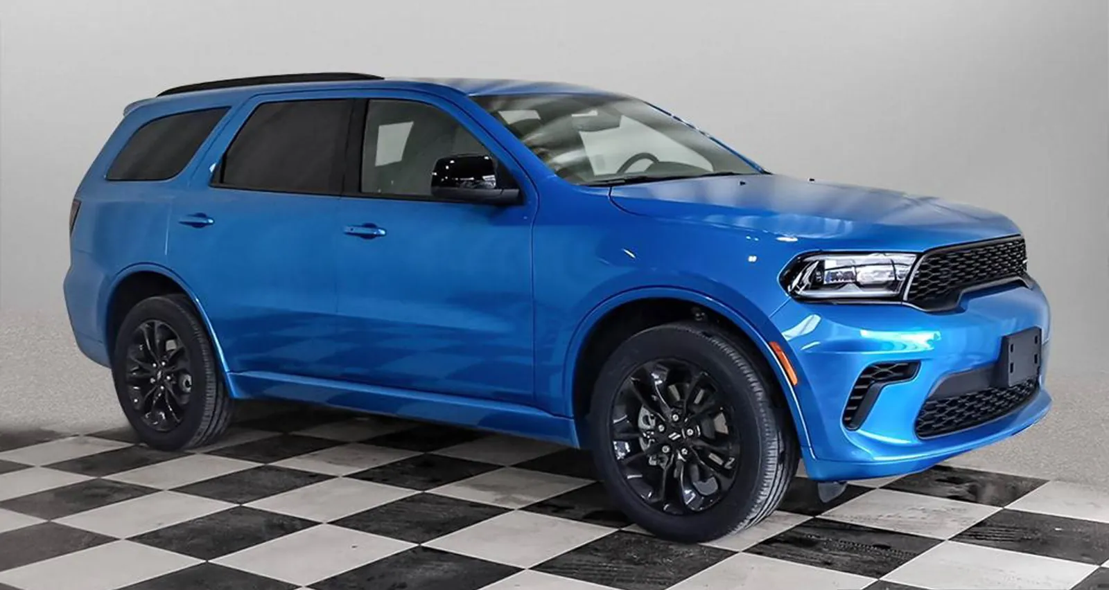 2026 Dodge Durango GT in B5 Blue, front three quarter view in a studio photo booth