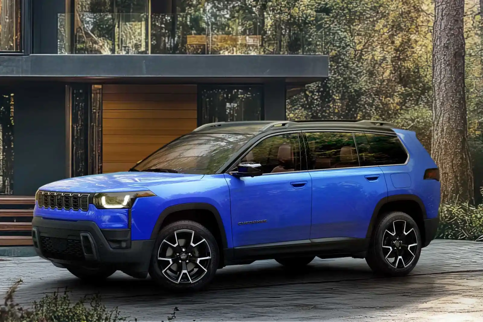 2026 Jeep Cherokee in blue, front three quarter view on a city street