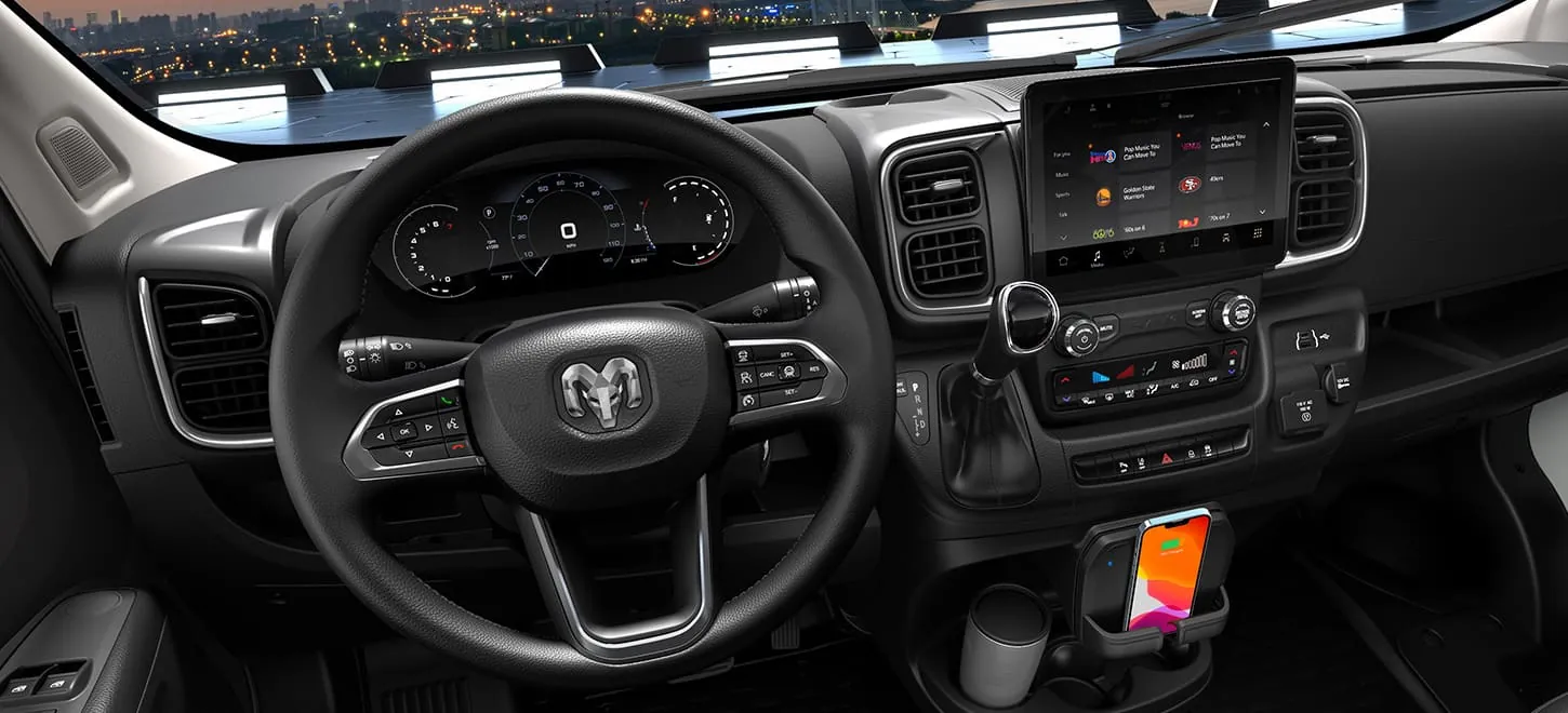 Ram ProMaster cab dashboard and touchscreen viewed from the driver seat