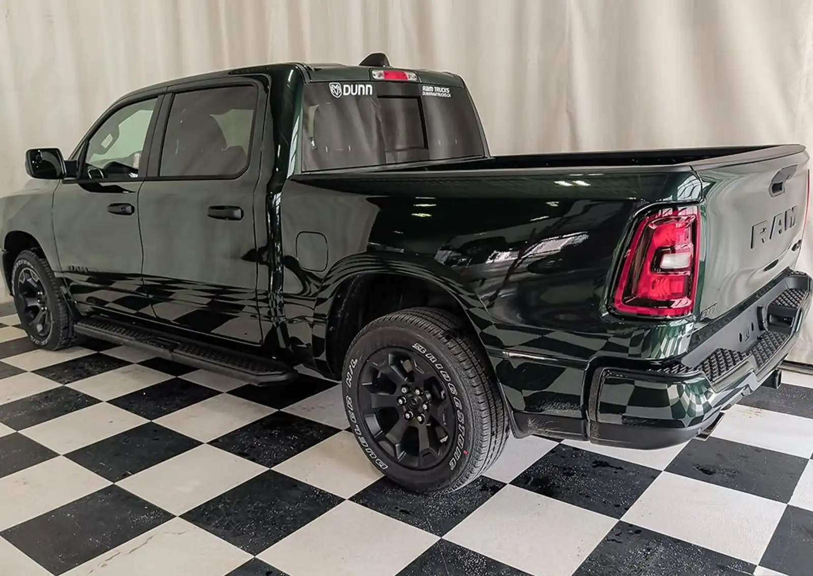 Green Ram 1500 Express Crew Cab rear three quarter studio exterior photo