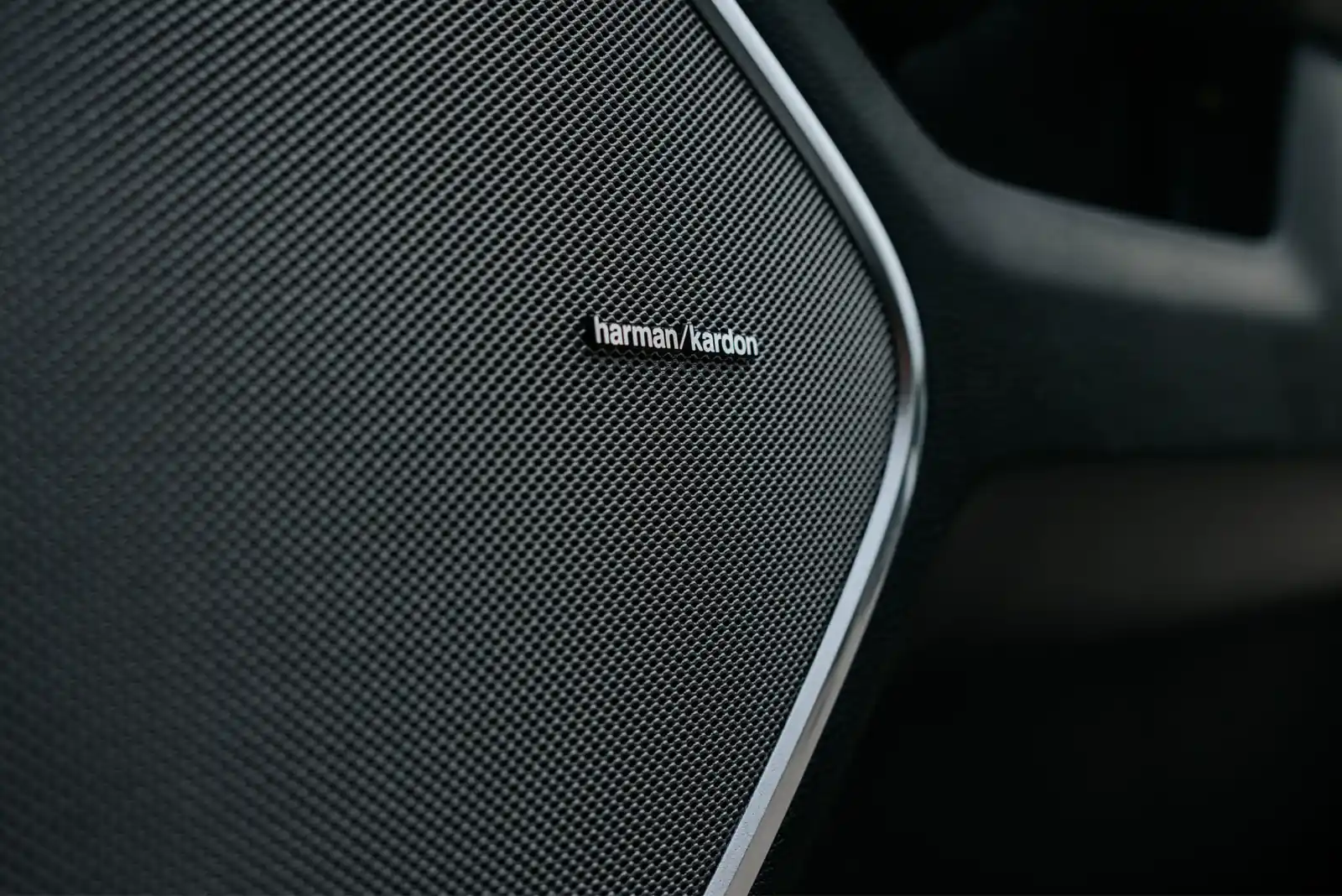 Harman Kardon speaker badge inside a Ram 1500 cabin
