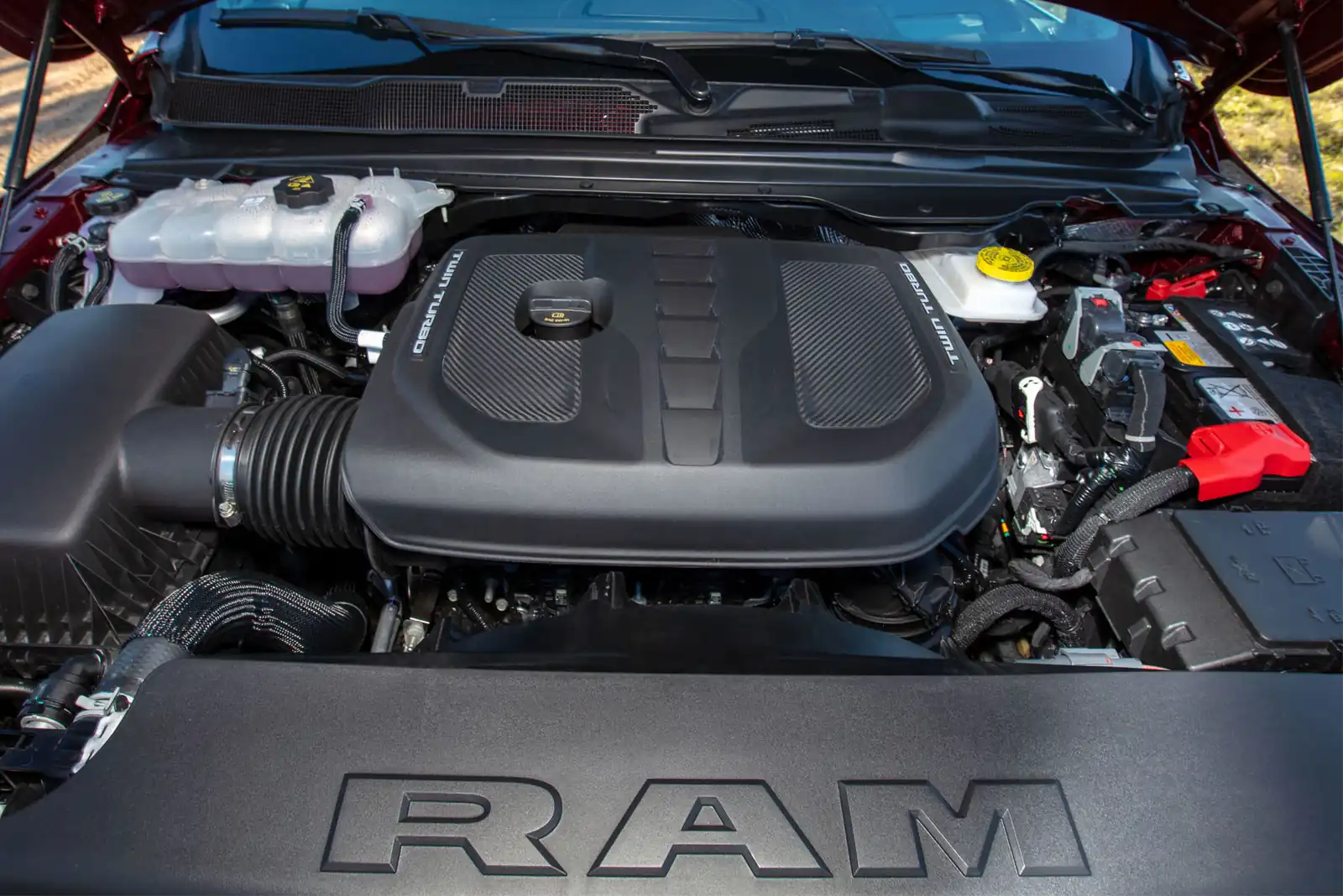 Ram 1500 Hurricane twin turbo inline six engine bay under an open hood