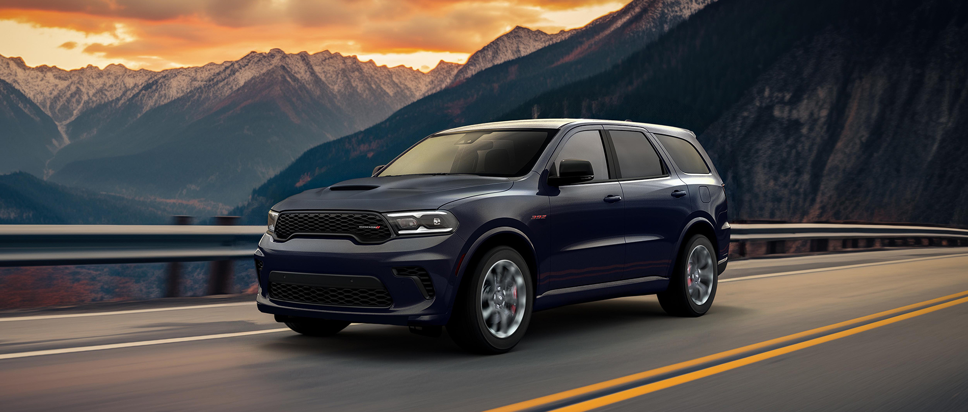 Blue 2027 Dodge Durango on a mountain highway, Dodge Canada photo