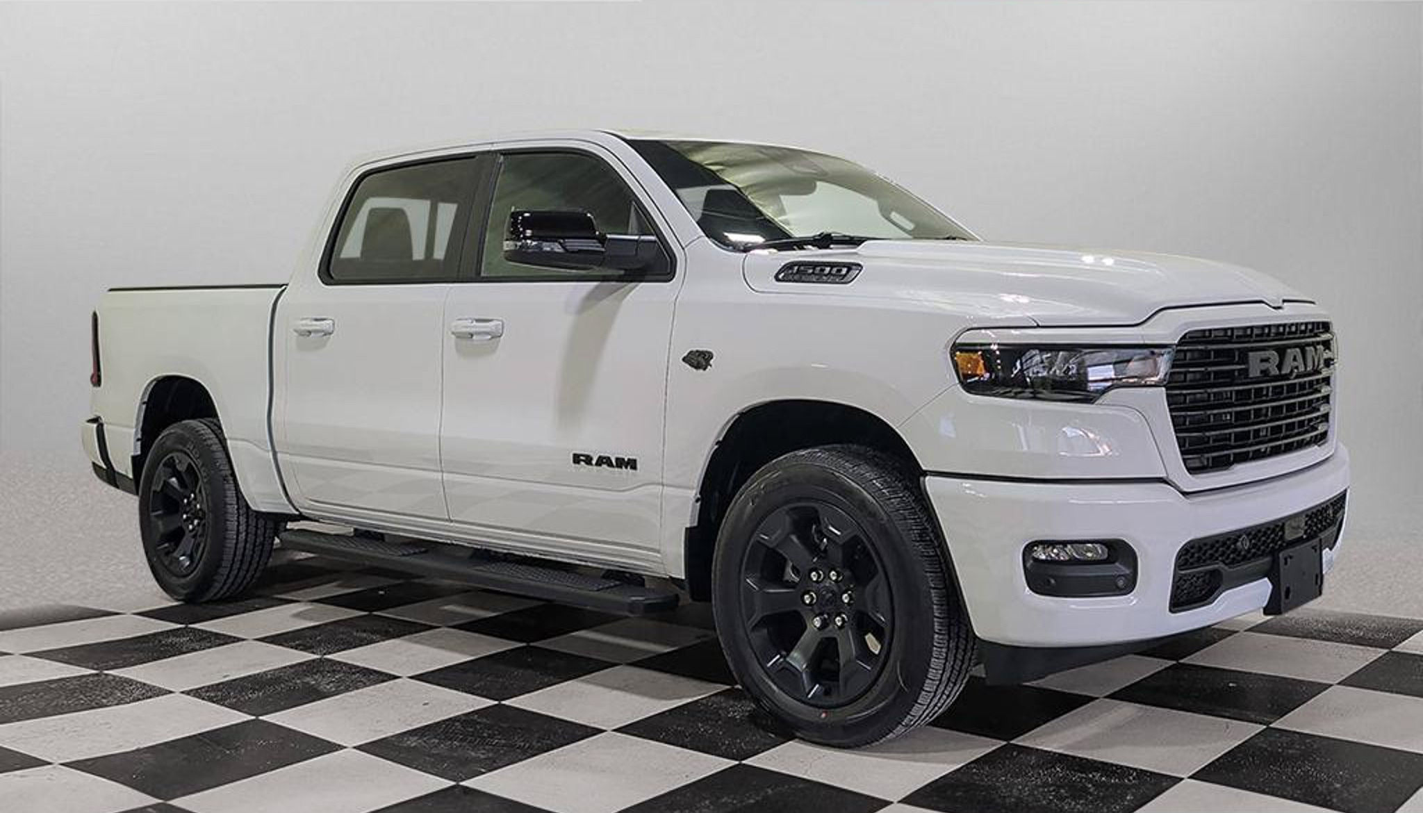 2027 Ram 1500 Sport in Bright White, studio photo of a Dunn Ram Trucks unit