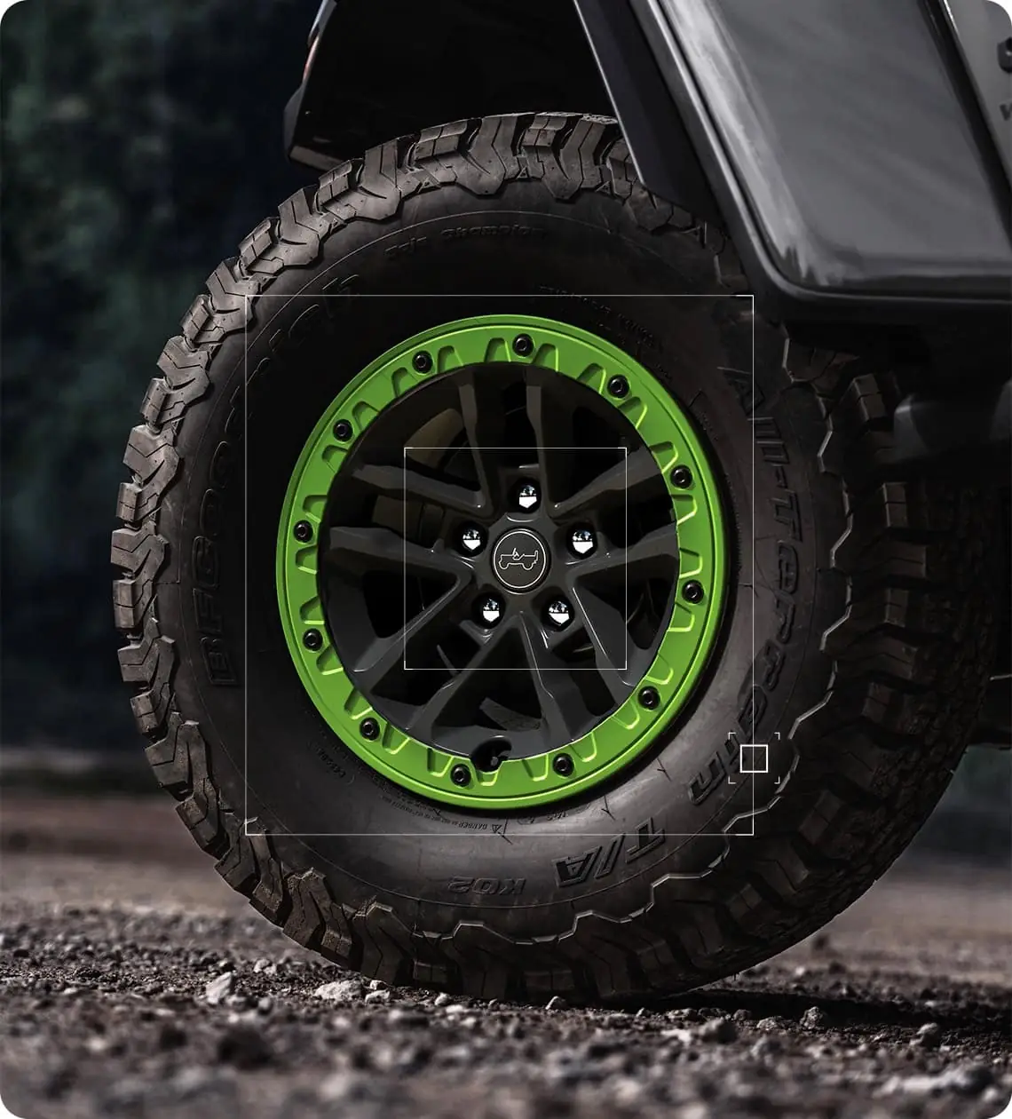 2027 Jeep Wrangler Switchback 17 inch Luster Grey beadlock wheel with Gecko Green ring and 35 inch all terrain tire