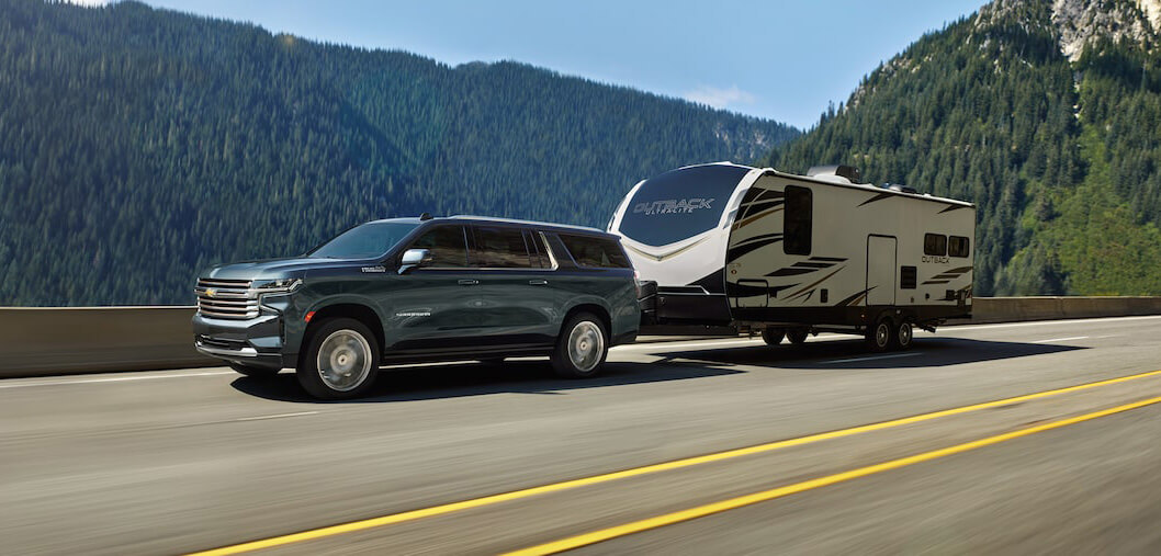 2023 Chevrolet Suburban towing a trailer