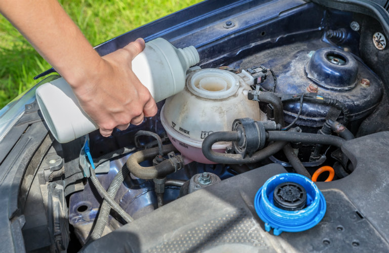 adding coolant to car ac