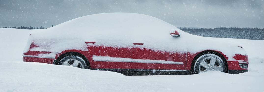 Car covered in snow