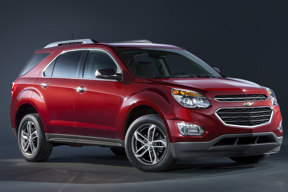 red 2016 Chevy Equinox on a dark background