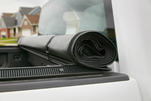 rolled up tonneau cover on a Chevy Silverado