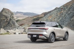 Vehicle in front on some hills and mountains