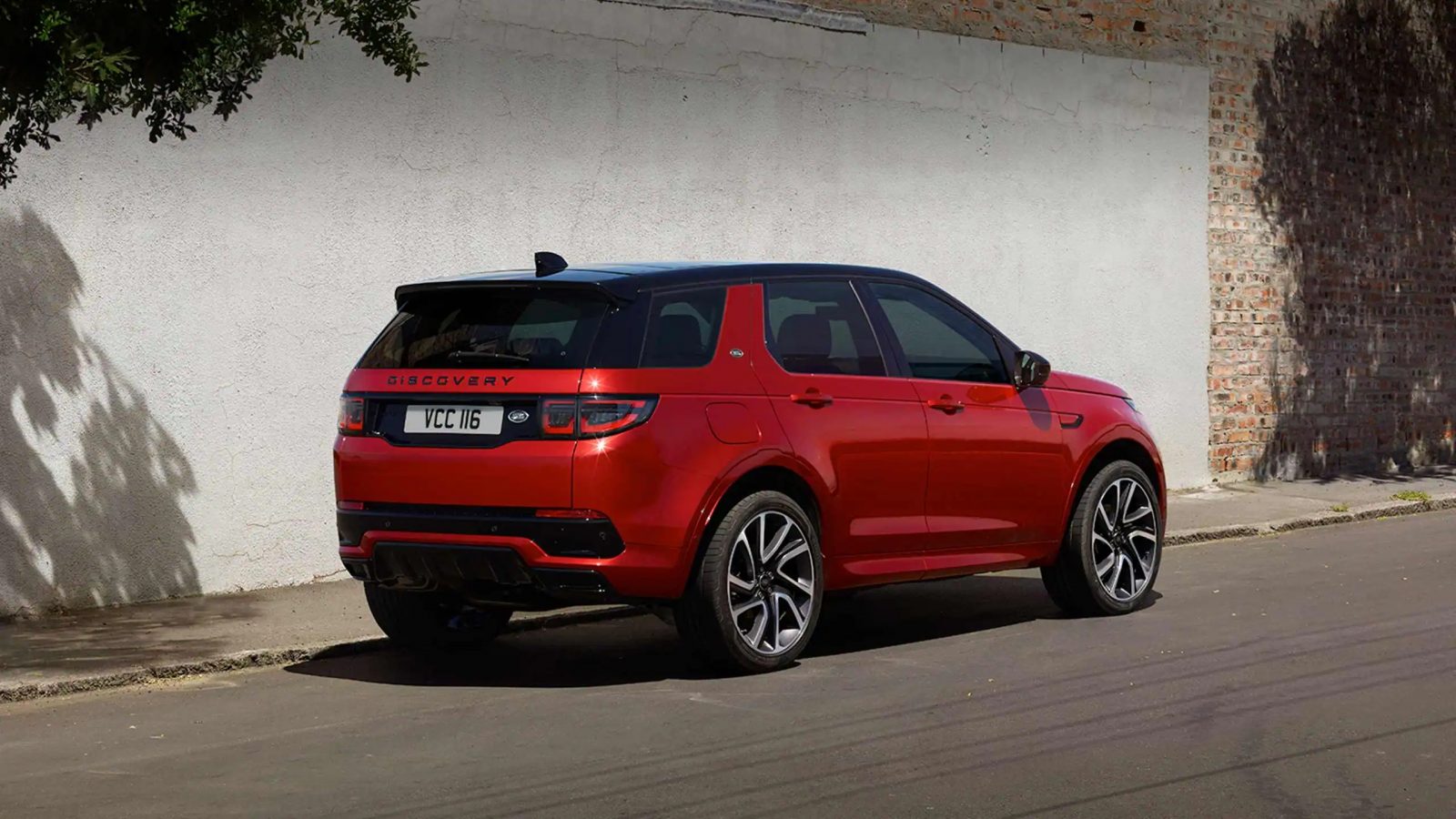 Parked Discovery Sport in Red-DYN_DX