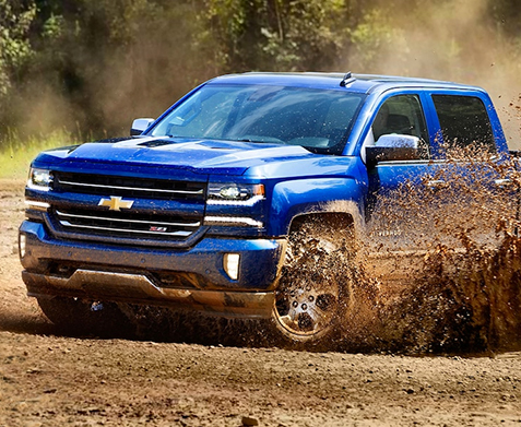 2018 Chevy Silverado driving through mud